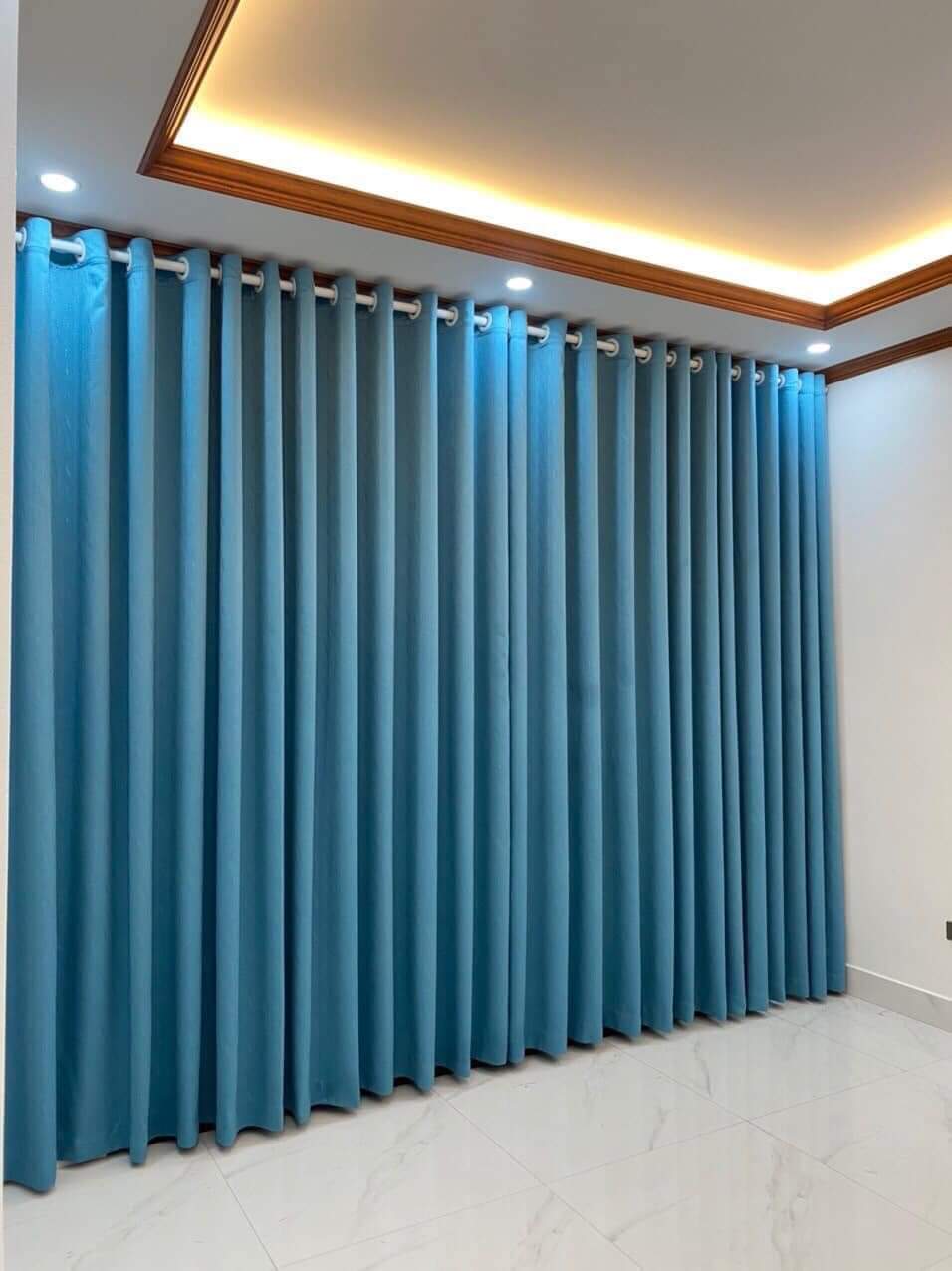 Rèm vải màu xanh ngọc cao cấp cho phòng khách trẻ trung